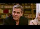 George and Amal Clooney meet refugees in Berlin