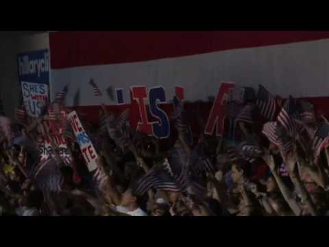 Supporters wait for Hillary Clinton to speak