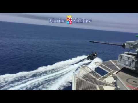 Italian navy and coastguard rescue nearly 2,000 migrants as calm seas return to Mediterranean