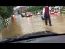 Drivers brave Japan streets during deadly floods