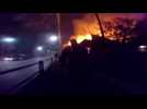 Dramatic footage shows moment Chilean police rescue elderly woman from burning house