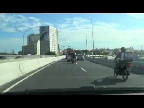 Dramatic video shows motorcyclists get knocked off highway overpass