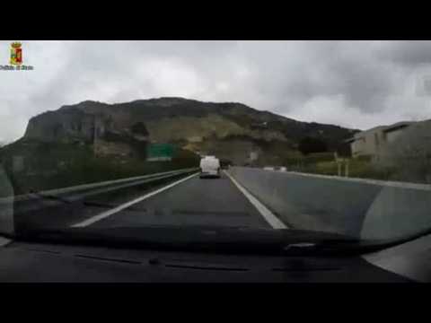 Armed Italian police chase minivan carrying migrants illegally trying to cross into France