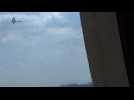 Video purports to show fighting, air strikes in western Aleppo