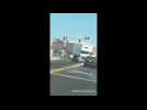 Cargo train smashes into truck in California