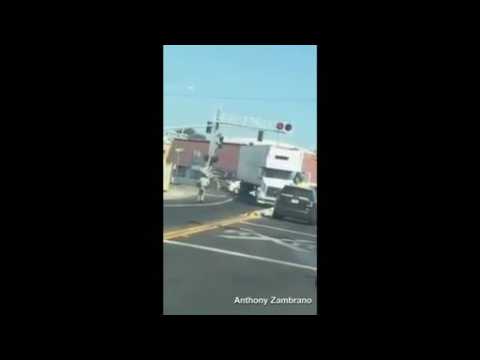 Cargo train smashes into truck in California