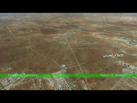 Syrian government and allied forces battle insurgents for ground south of Aleppo city