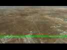 Syrian government and allied forces battle insurgents for ground south of Aleppo city