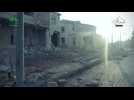 Amateur video shows aftermath of clashes in western Aleppo suburb