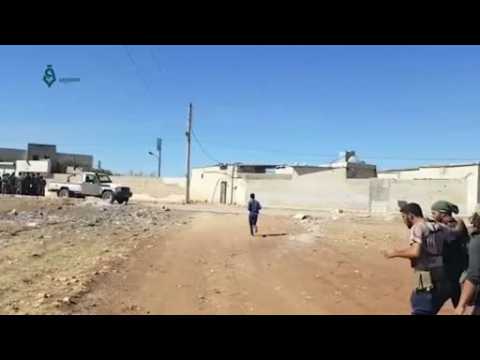 Syrian rebels seize village where Islamic State promised final battle