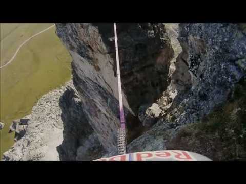 World champion rides bike over slackline in the Alps