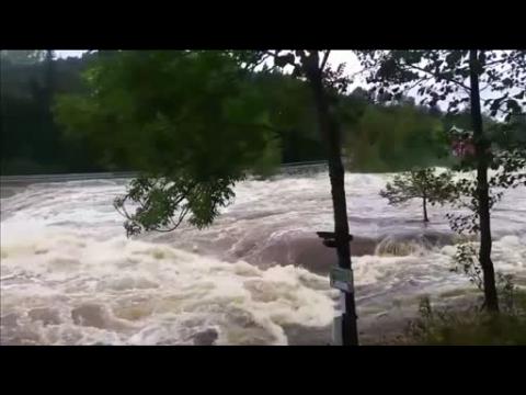 Eyewitness video shows floods sweeping through Norway's Telemark County