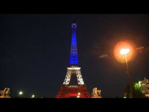 Red,white, blue Eiffel Tower in homage to Nice attack victims