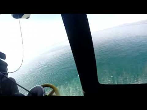 Migrant hoisted to safety from sinking boat in dramatic helicopter rescue off Turkish coast