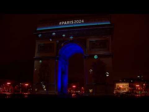 Paris illuminates Arc de Triomphe for big reveal of 2024 Olympic bid logo