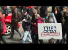 Trade deal foes hold major German rally on eve of Obama visit