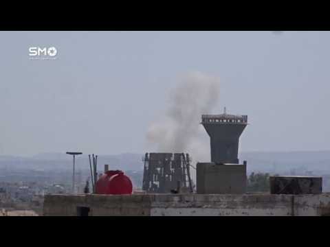 Amateur video shows aftermath of alleged mortar attack in Damascus suburb