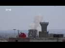 Amateur video shows aftermath of alleged mortar attack in Damascus suburb