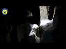 Girl pulled out from rubble in Aleppo -- amateur video