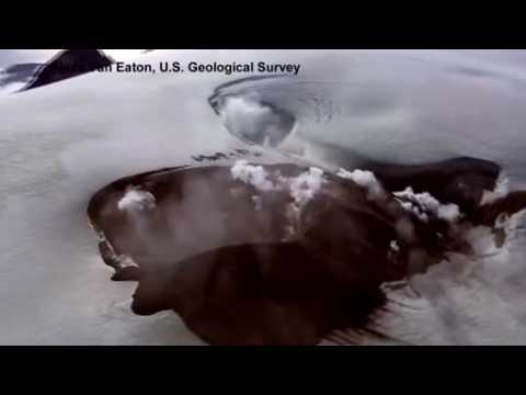 Helicopter footage shows crater 'degassing' on remote Alaska island
