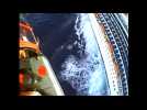 U.S. Coast Guard medically evacuates a woman from a cruise ship