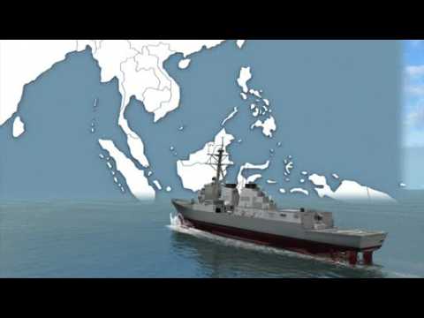 US Navy destroyer sails near Chinese man-made islands in disputed waters
