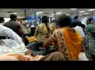 India's death toll hits new record as Covid 'tsunami' worsens: images inside crowded Delhi hospital