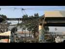 Workers continue to remove debris of collapsed metro line in Mexico City
