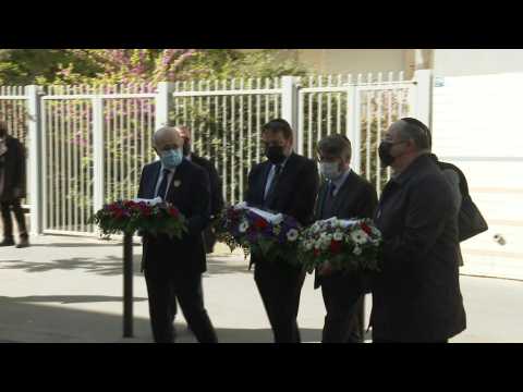 Wreaths laid in front of murdered Jewish woman's building in Paris