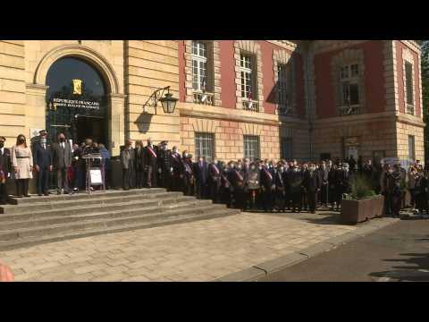 French ministers, family pay tribute to slain police officer