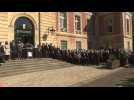 French ministers, family pay tribute to slain police officer