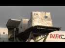 French virus aid touches down in Indian capital