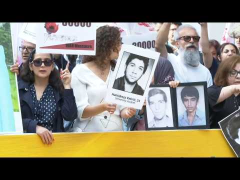 Protest outside court in Stockholm as war crimes trial of ex Iranian official opens