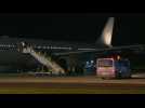 Evacuees from Afghanistan disembark from UK military plane in England