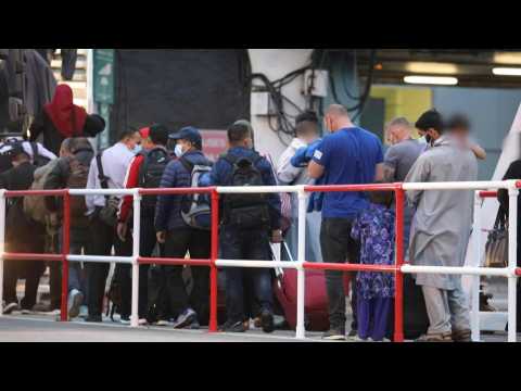 Charter flight with Afghan refugees lands in England