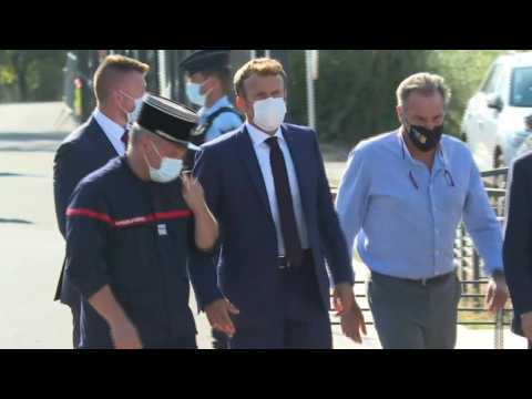 Macron visits site of wildfires, talks to firefighters in France's south