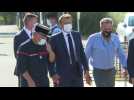 Macron visits site of wildfires, talks to firefighters in France's south