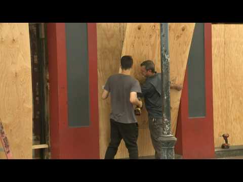New Orleans businesses board up windows as Hurricane Ida approaches