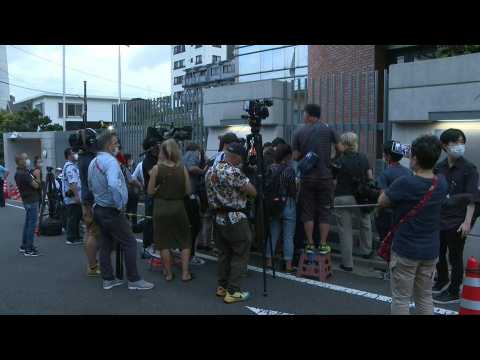 Scene outside Tokyo's Polish embassy, reported location of Belarus Olympian
