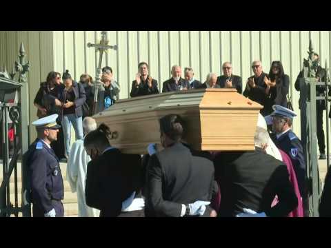 Coffin of late French tycoon Bernard Tapie arrives at cathedral for ceremony