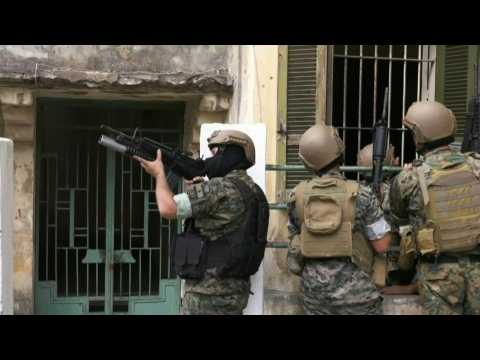 Lebanese army mobilise in the streets of Beirut as gunshots heard following protest