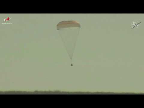 Russian crew back on Earth after filming first movie in space