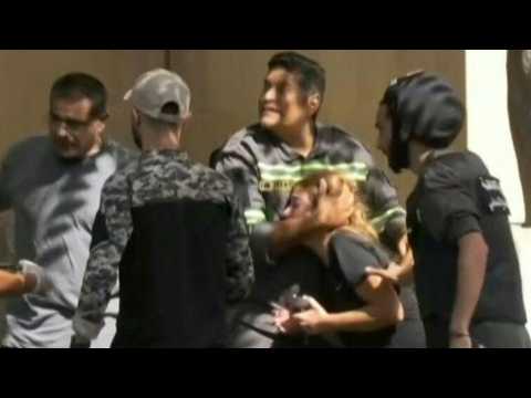 Residents run for cover as gunfire battles rage in Beirut