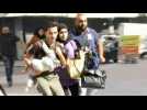 BEIRUT: Family runs cradling toddler as they flee gunfire battle