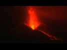 Lava erupts from Cumbre Vieja volcano at night in La Palma