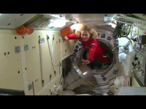 Russian crew arrives at the ISS to film first movie in space