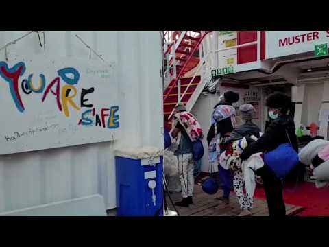 Dozens of rescued migrants disembark in Sicilian port of Trapani