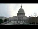 Police stand guard at US Capitol on morning of Jan 6 riot anniversary