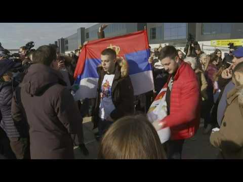 Fans and journalists wait for Novak Djokovic at Belgrade airport