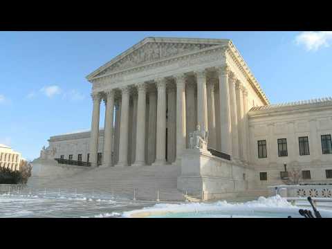 Illustrations outside US Supreme Court, to hear challenges to Covid vaccine mandates